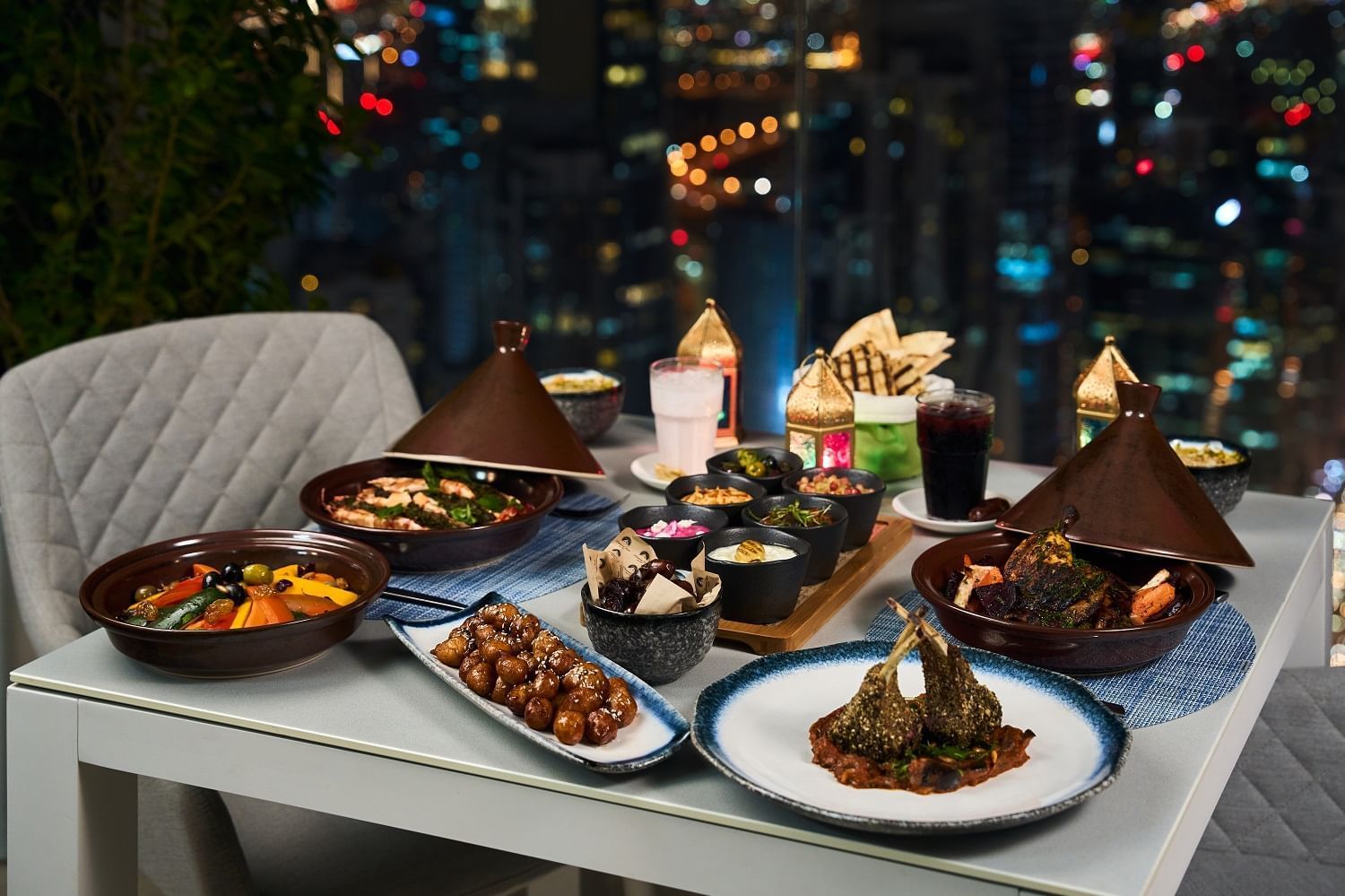 Close-up of dining table arranged for Suhoor in Malibu Sky Lounge at Paramount Hotel Midtown