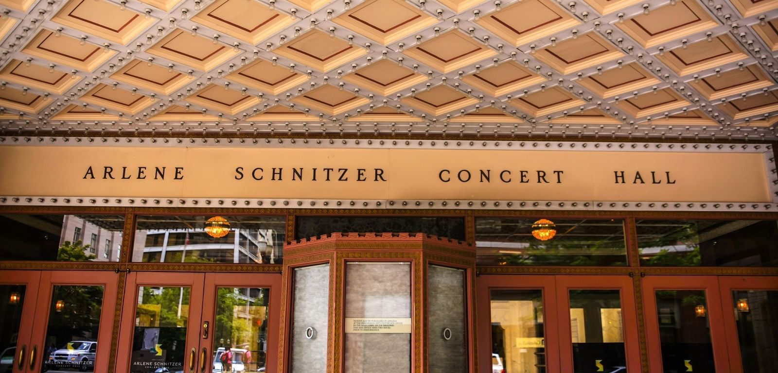 The exterior of a building with a sign reading 'Arlene Schnitzer Concert Hall'