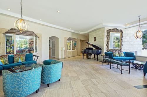 Interior of the lobby area with lounges at Bougainvillea Resort
