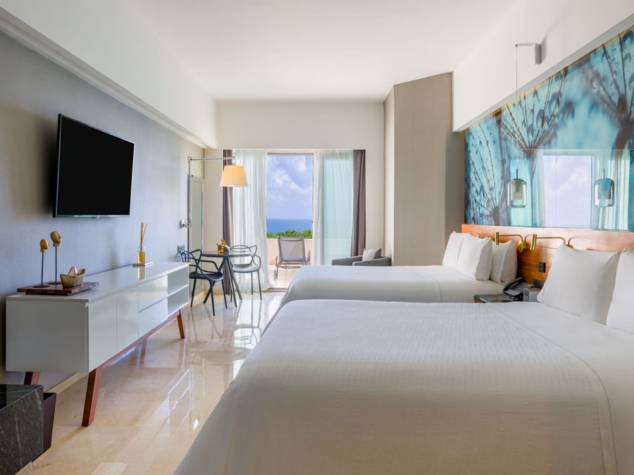 2 Double beds & TV in Ocean view Room with Terrace at Live Aqua