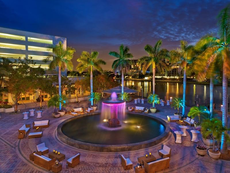 Lounges by the outdoor fountain at The Diplomat Resort