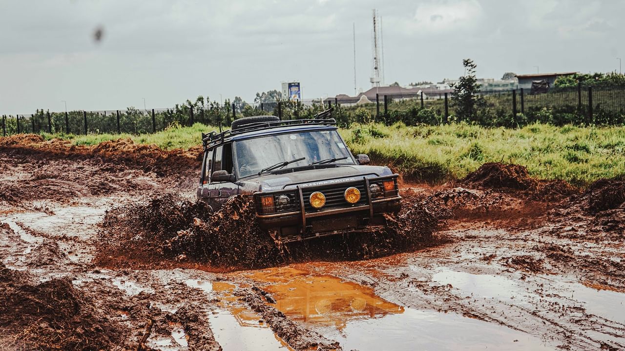 Vehicle driving through muddy water.
