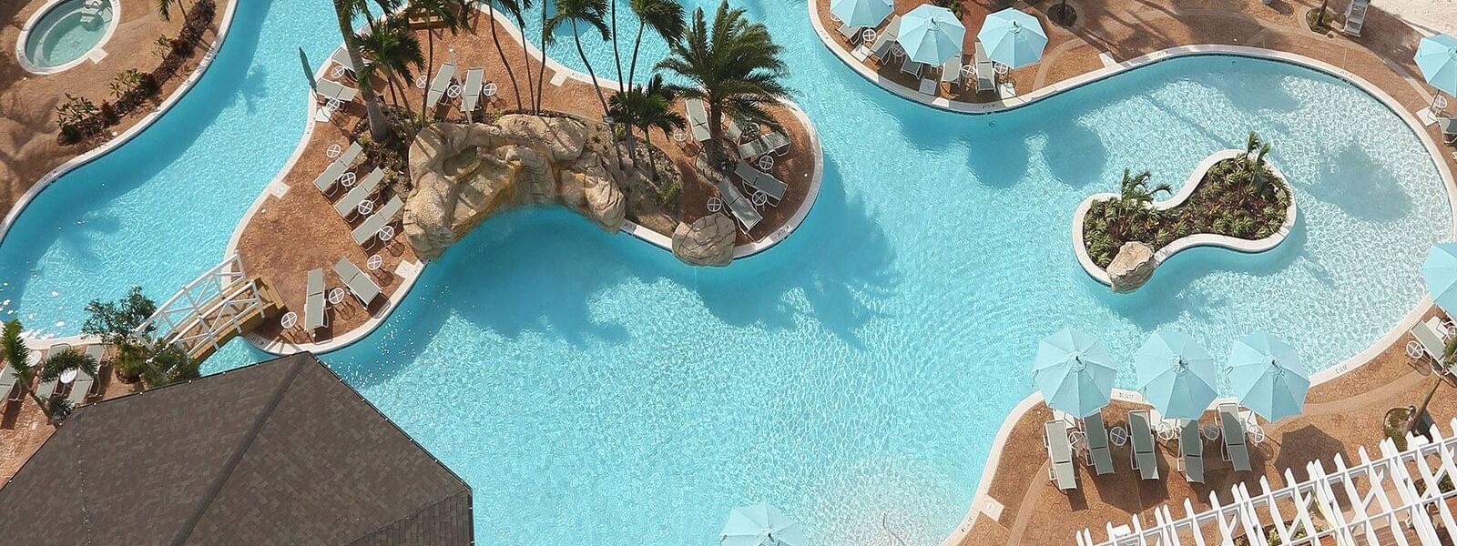 Aerial view of the pool & lounging beds at Warwick Paradise Island Bahamas