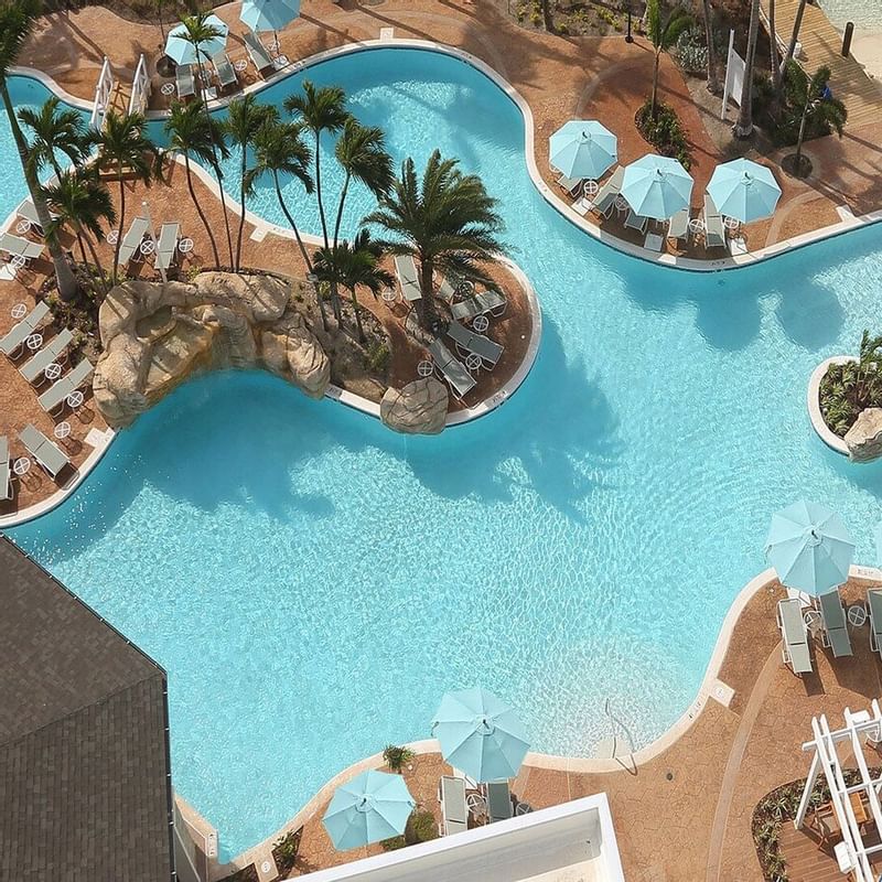 Aerial view of the pool & lounging beds at Warwick Paradise Island Bahamas