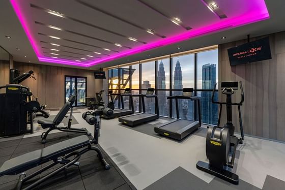 O2 Gym with exercise equipment and panoramic cityscape view at Imperial Lexis, fitness center in KL