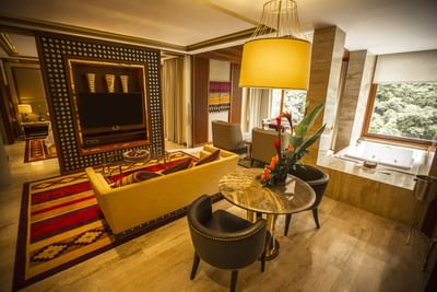 Living space in Imperial Suite with river view at Hotel Sumaq