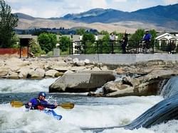 A man rafting on Boise river near Hotel 43