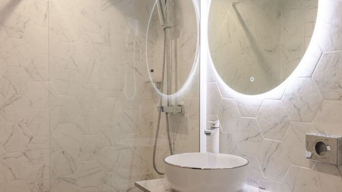 Bathroom vanity in bedrooms at Hotel Rennes South Chantepie