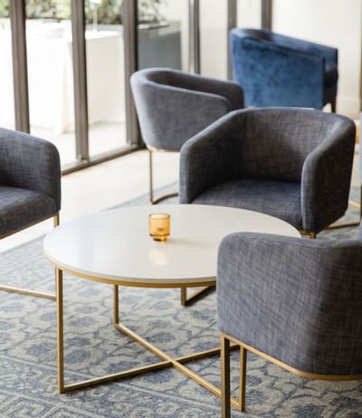 A set of chairs with a table at Luxe Sunset Boulevard