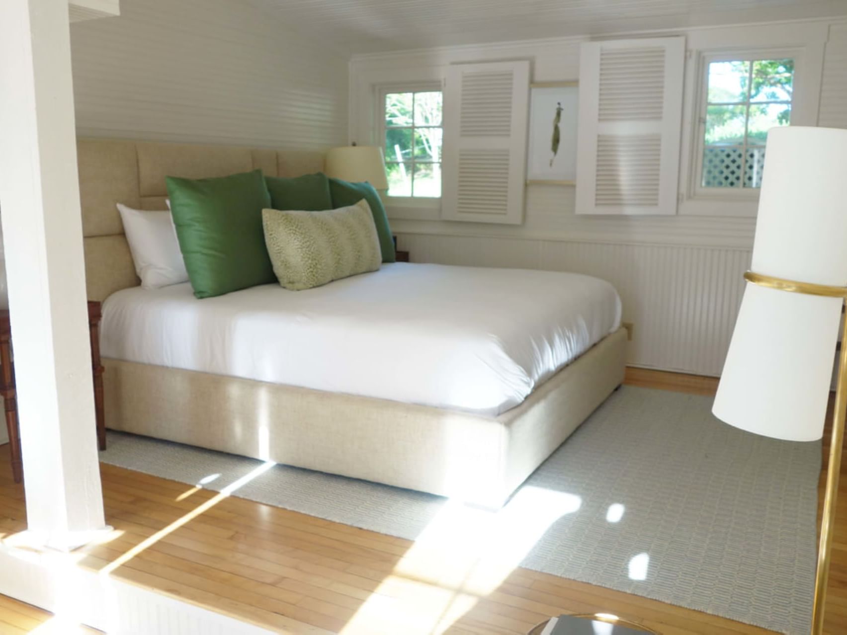 King bed, chair & nightstand in Keswick Room at The Clifton