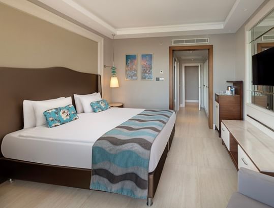 TV & coffee maker by the bed in Major Suite at Titanic Deluxe Golf Belek
