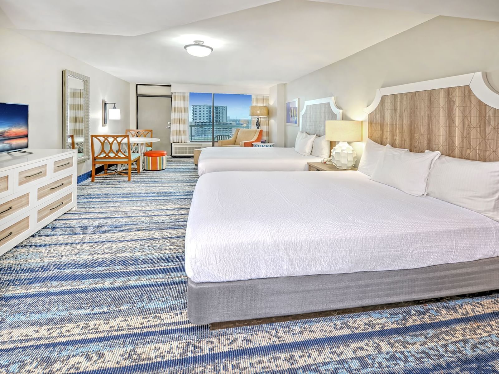 Ocean View Room at Bahama House, Daytona Beach, with two beds and a balcony.