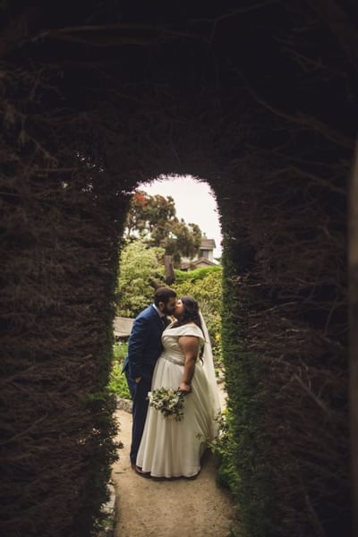Wedding couple posing onsite