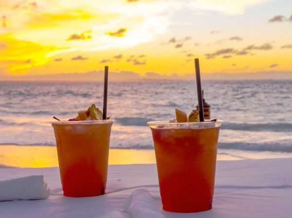 Close-up of 2 cocktails on beach at The Somerset On Grace Bay