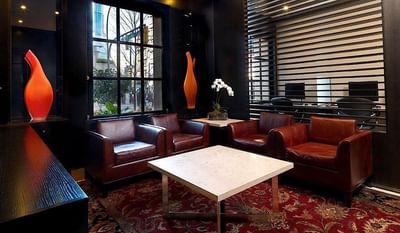 Lounge area with plush seating by the Business Center at The St. Regis Hotel Vancouver