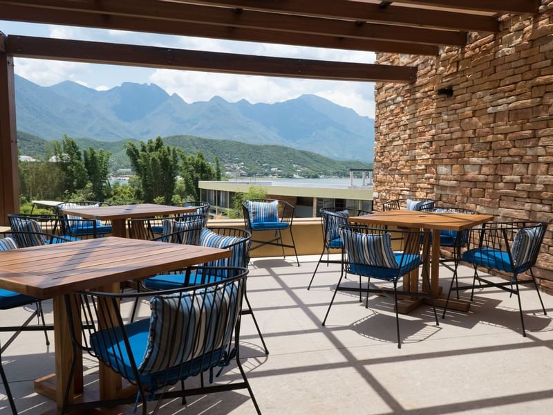 Rooftop dining area in Los Agapantos at Gamma Hotels