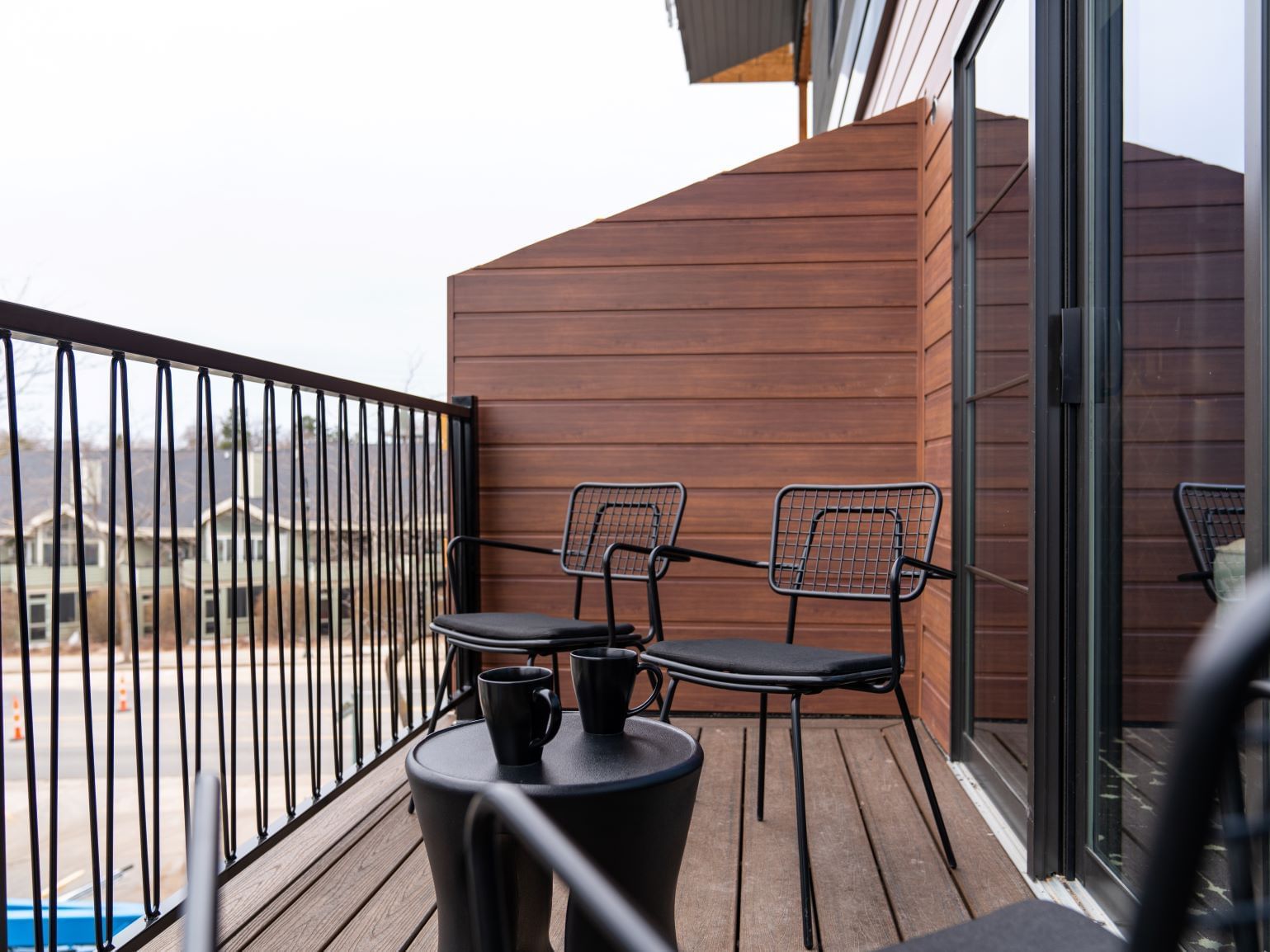 Balcony lounge area overlooking the view from Two Queen Room at The Earl