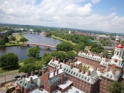 aerial view of buildings next to a river