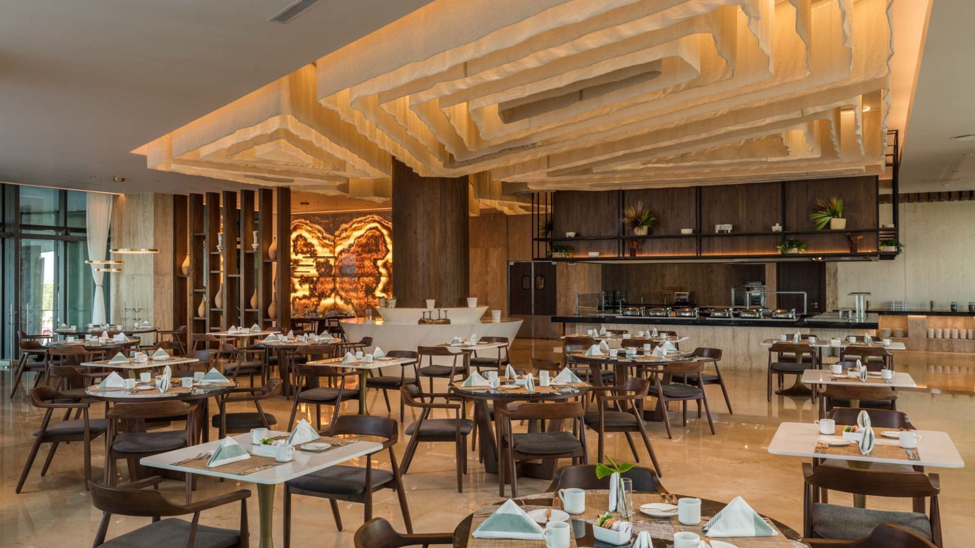 Modern upscale dining room in La Huerta with unique architectural ceiling design at Camino Real Mérida