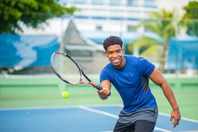 Man playing tennis