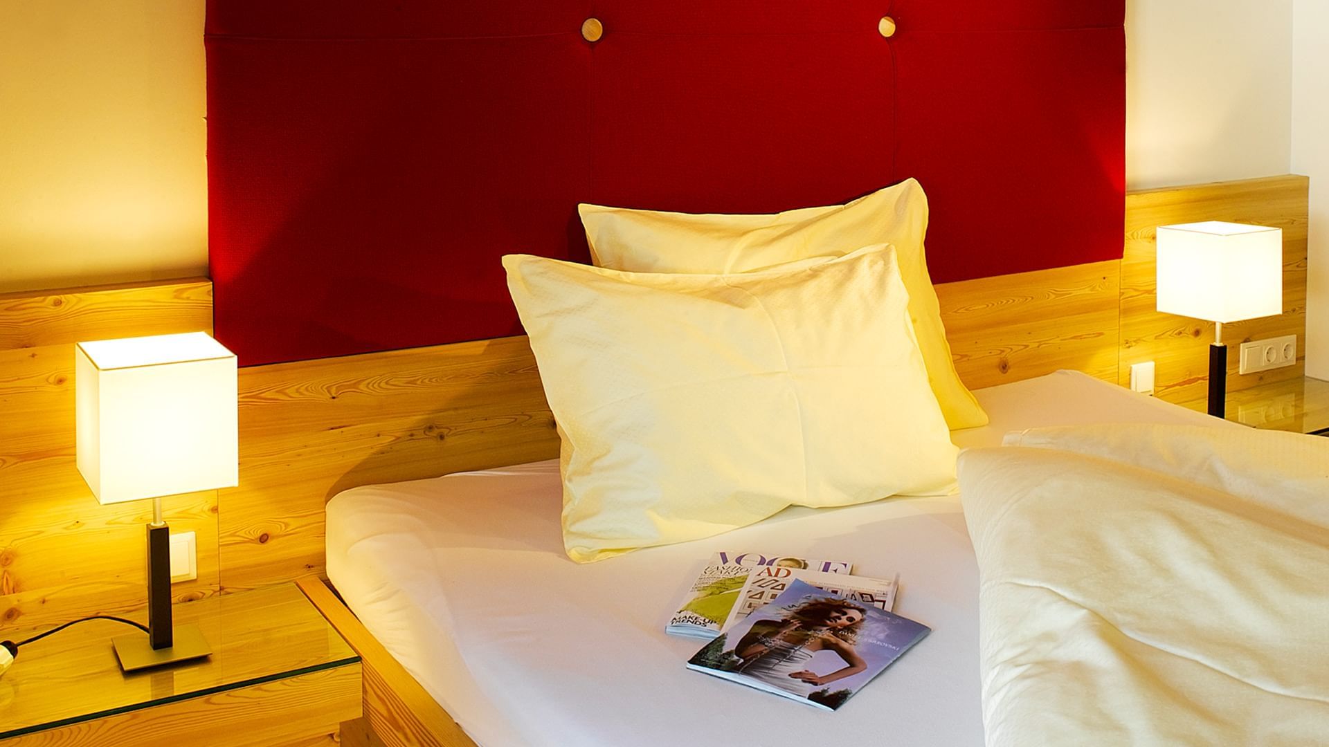 Superior Family Suite, bed with magazines, Falkensteiner Hotels