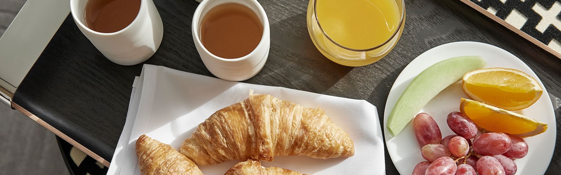 Breakfast plates served on a table at Crown Hotels