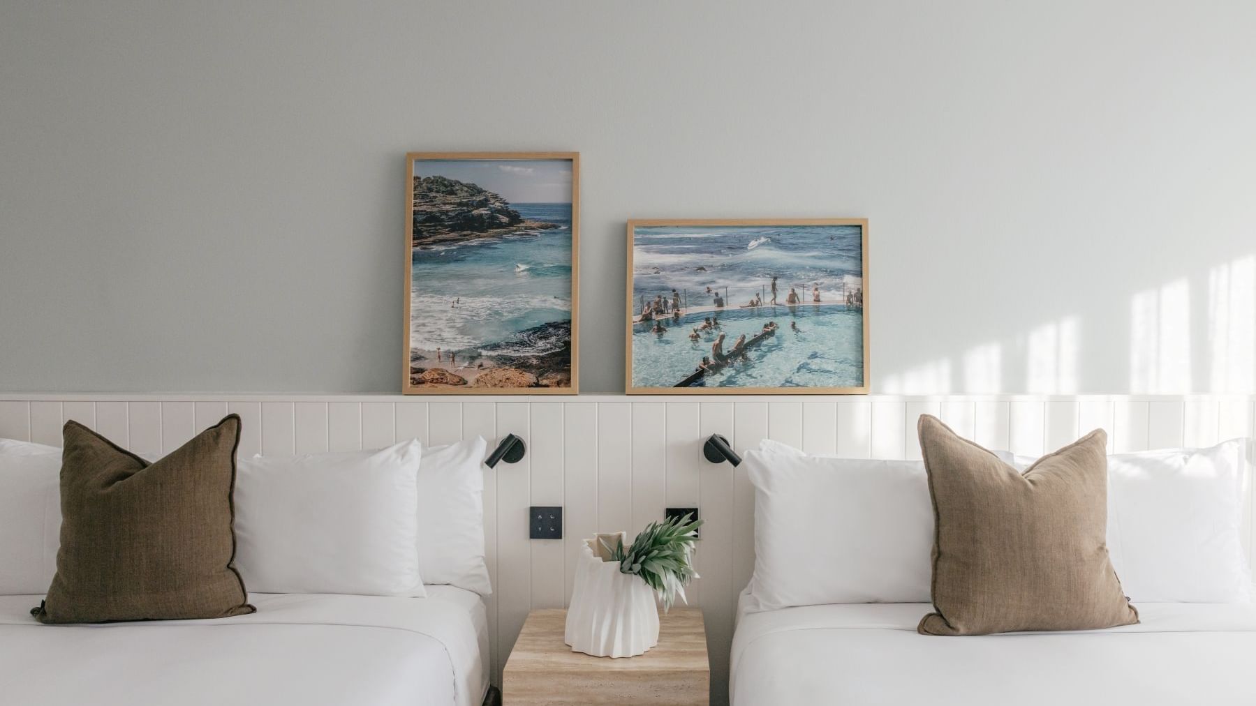 Ocean View Terrace Twin at Elysium Manly with olive linen cushions by a nightstand & vase, best places to stay in Manly
