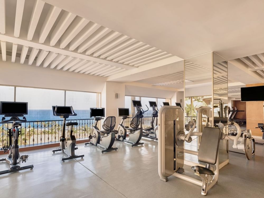 Exercise machines in a Gym wellness center at Grand Fiesta Americana