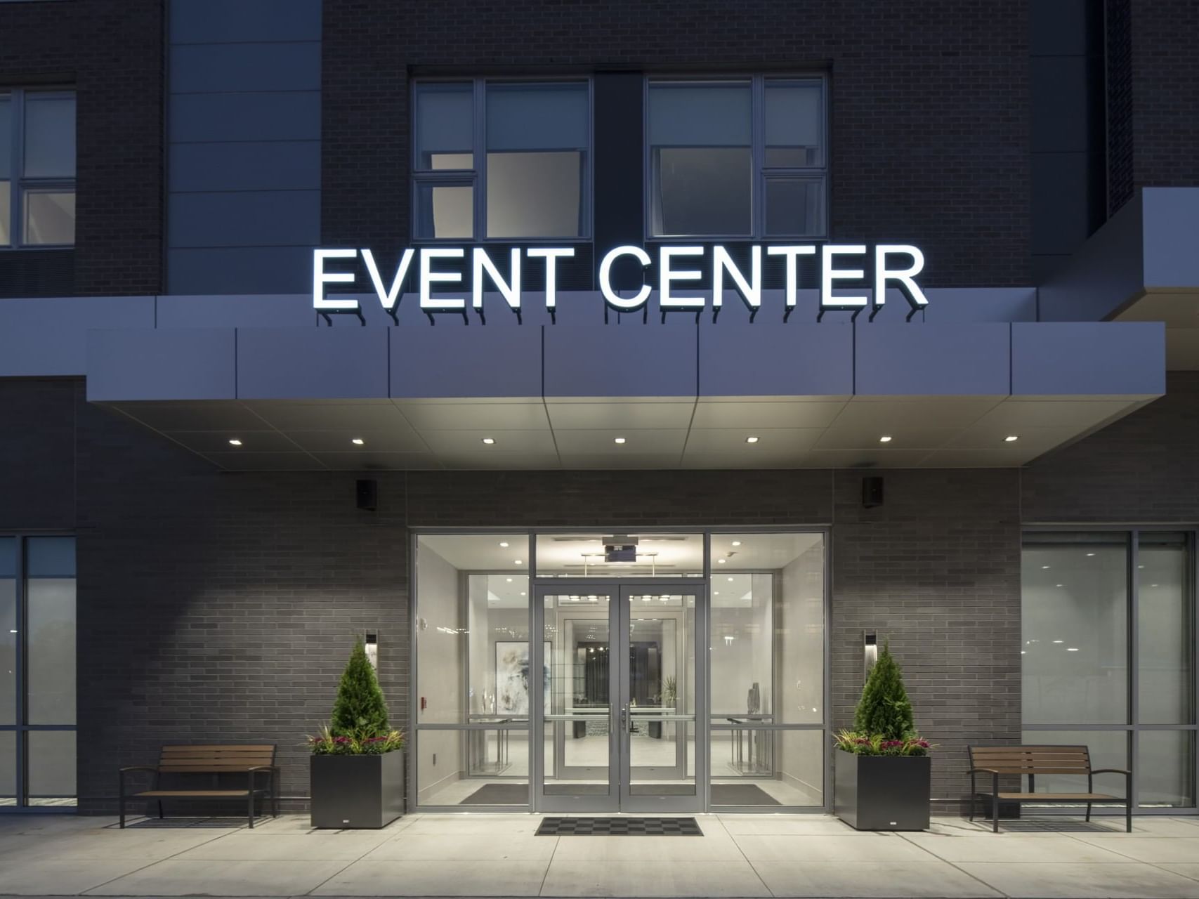 Exterior of Natick MA Event Center at night with lights