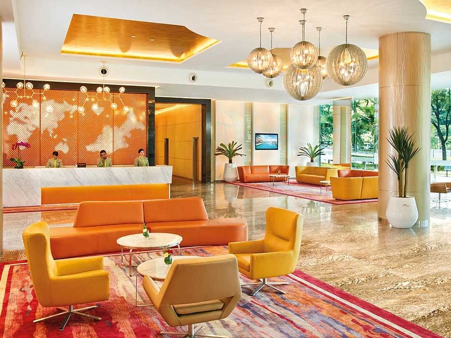 Lobby area with front desk with receptionists at Sunway Velocity Hotel