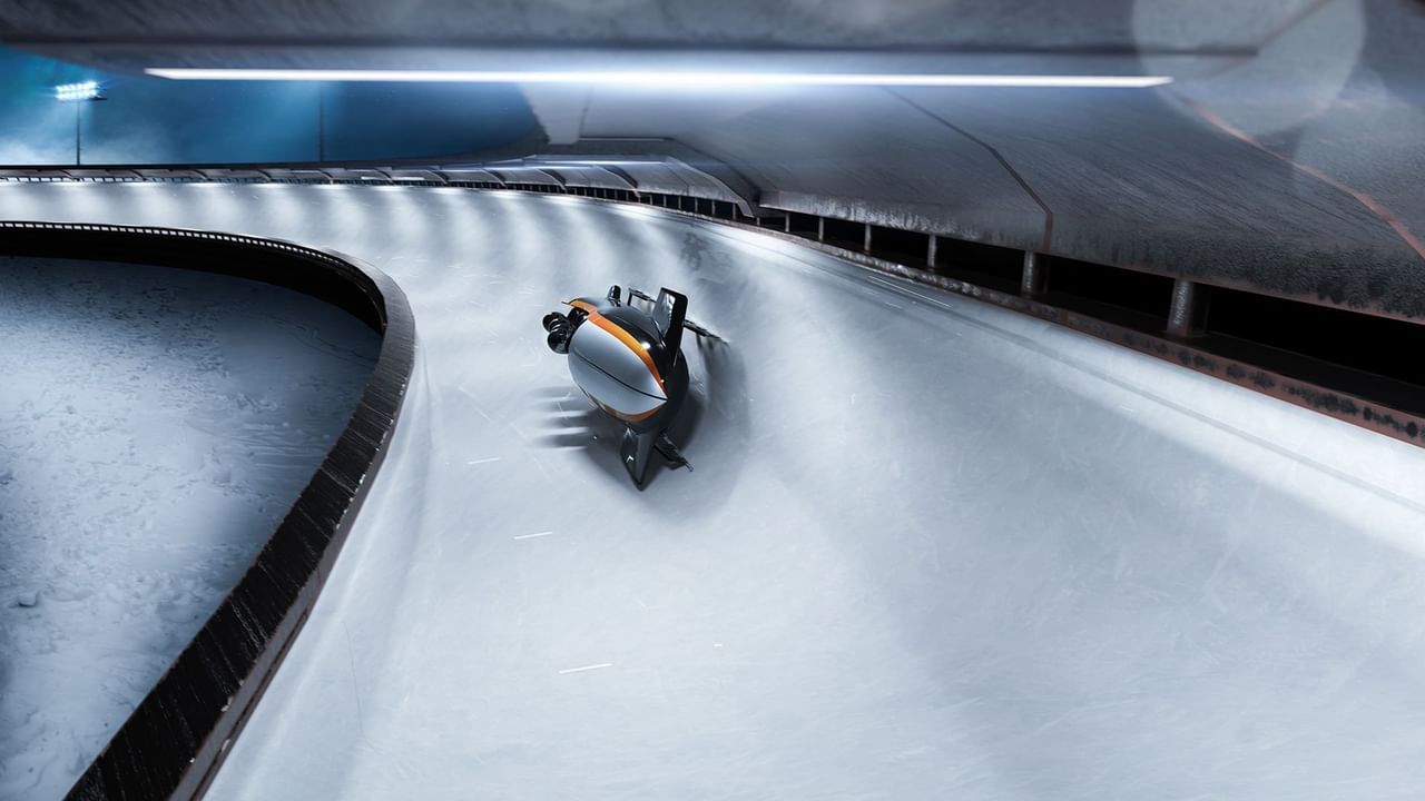 Athletes bobsleighing in Whistler Sliding Centre near Listel Whistler, a Coast Hotel