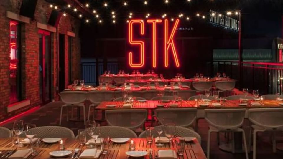 Dining tables of STK Steakhouse near Legacy Vacation Resorts