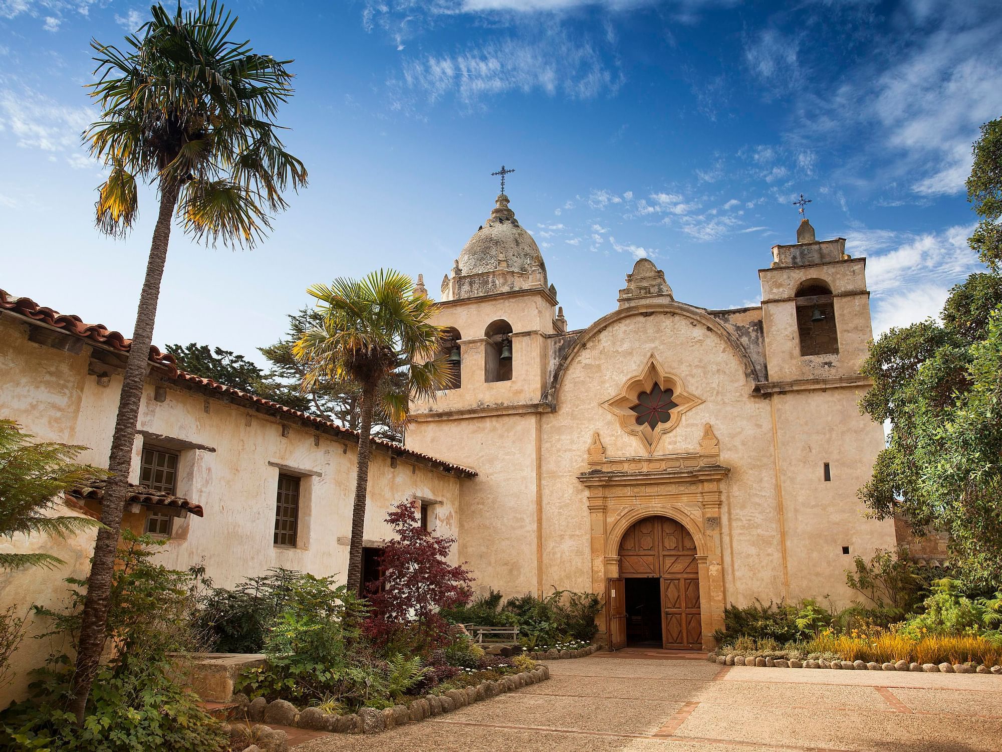 Exterior view of Carmel Mission Church near Tally Ho Inn