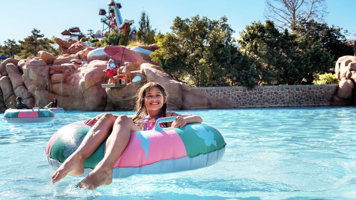 Girl enjoying in Disney's Blizzard Beach Lazy River near Lake Buena Vista Resort Village & Spa