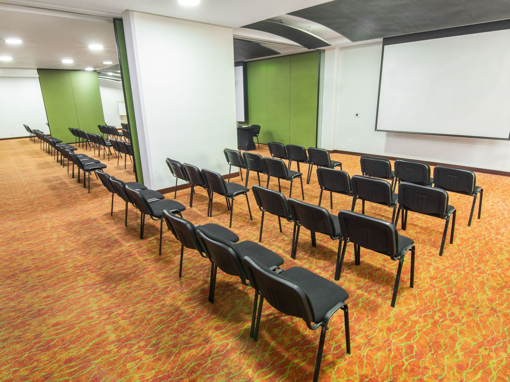 The arranged Montana meeting room with black chairs