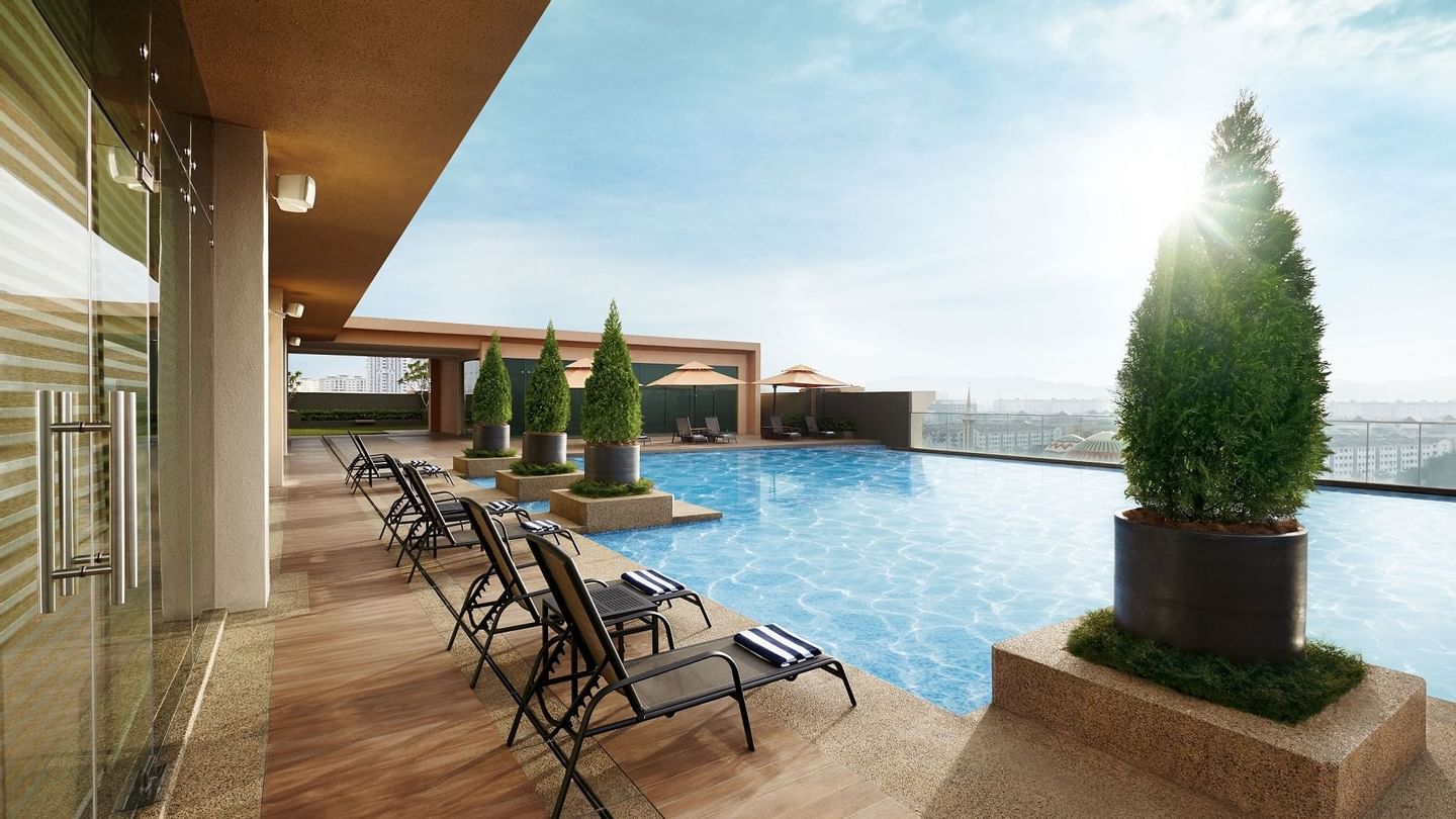 Sunbeds by the infinity pool area at Sunway Lagoon Hotel