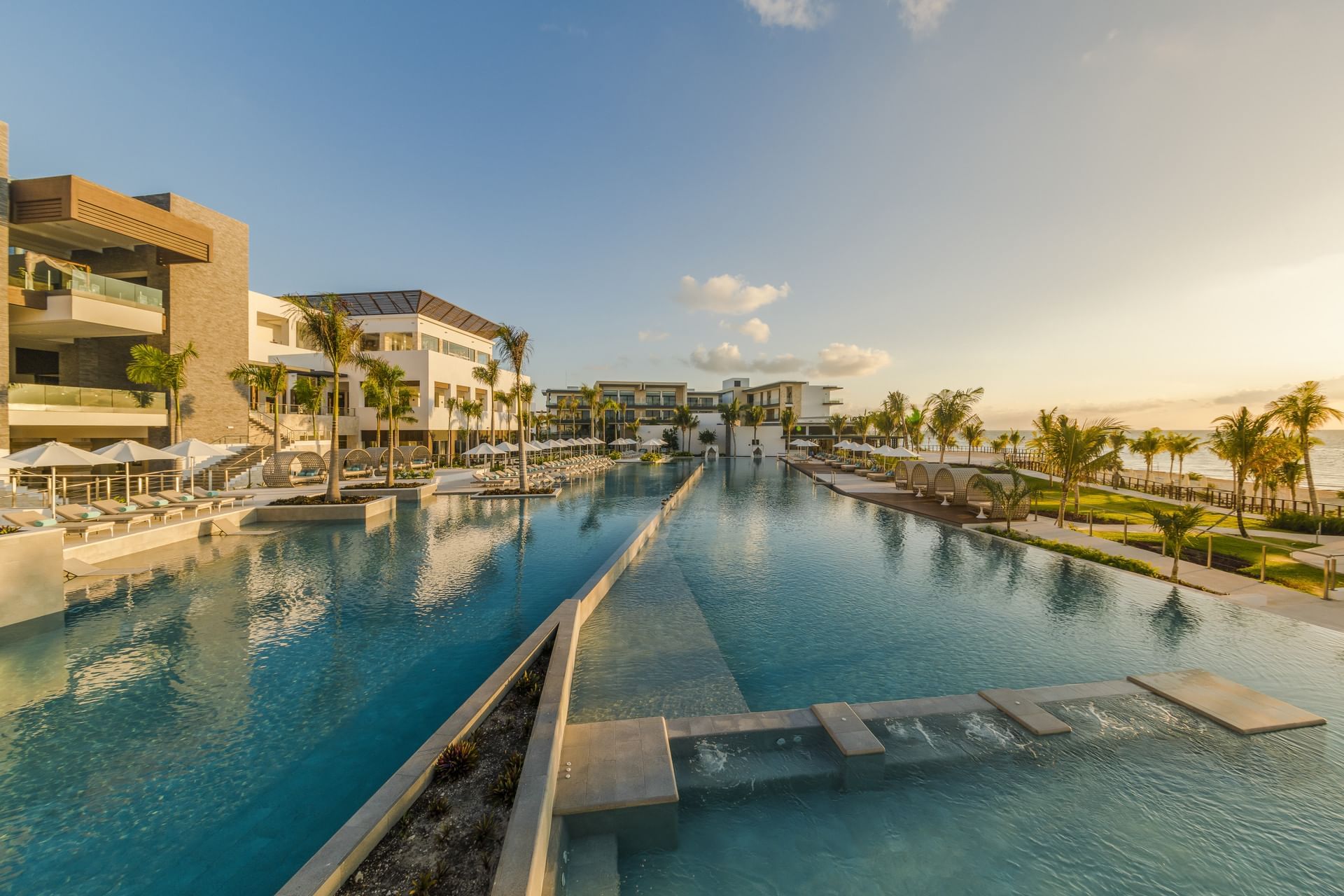 Low shot of the pool and hotel Haven Riviera Cancun