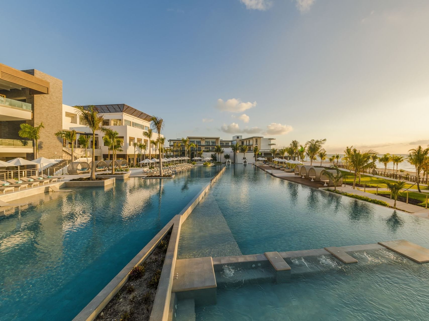 Low angle shot of the pool and hotel Haven Riviera Cancun