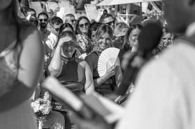 Couple exchanging vows surrounded by guests at Bougainvillea Barbados