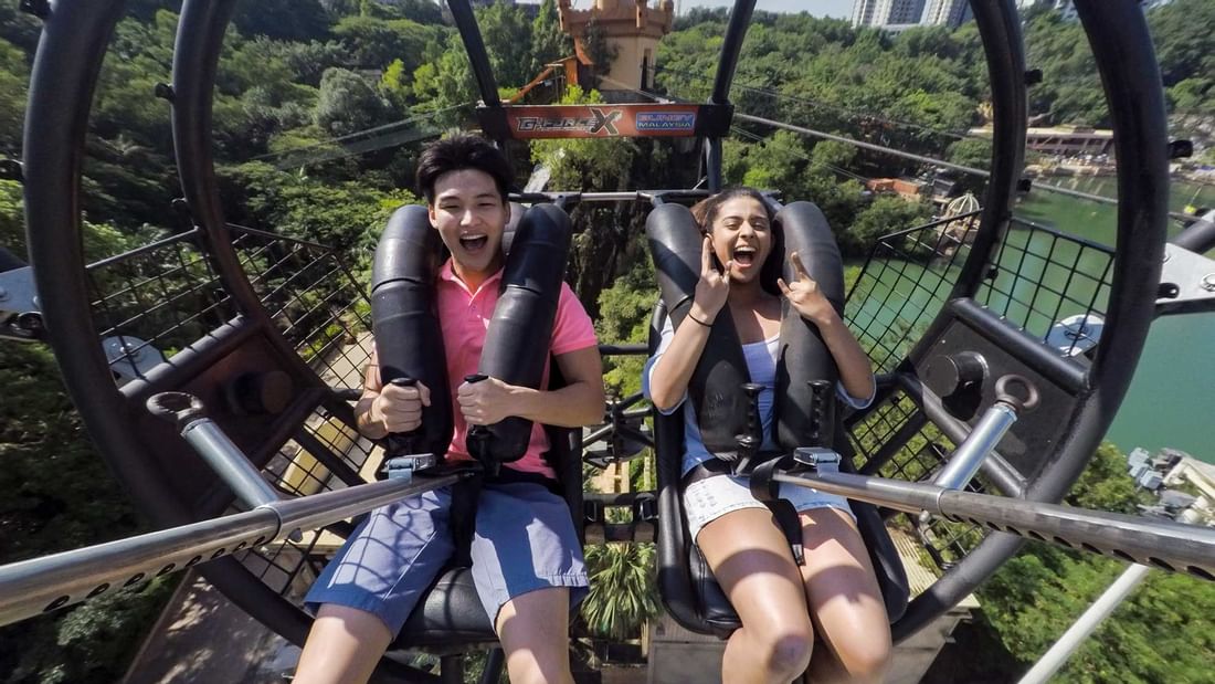 A couple on a roller coaster ride near Sunway Lagoon