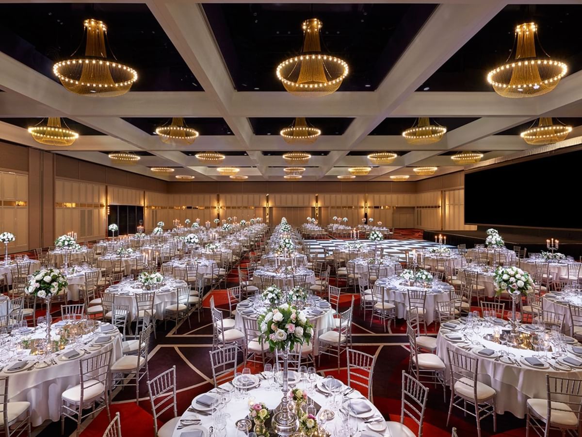 Banquet set-up with floral decor in the Grand Ballroom at Crown Towers Perth