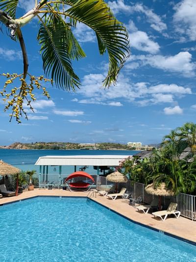 swimming pool at Emerald Beach Resort, laid-back island escapes at a St. Thomas resort with pool facing the ocean