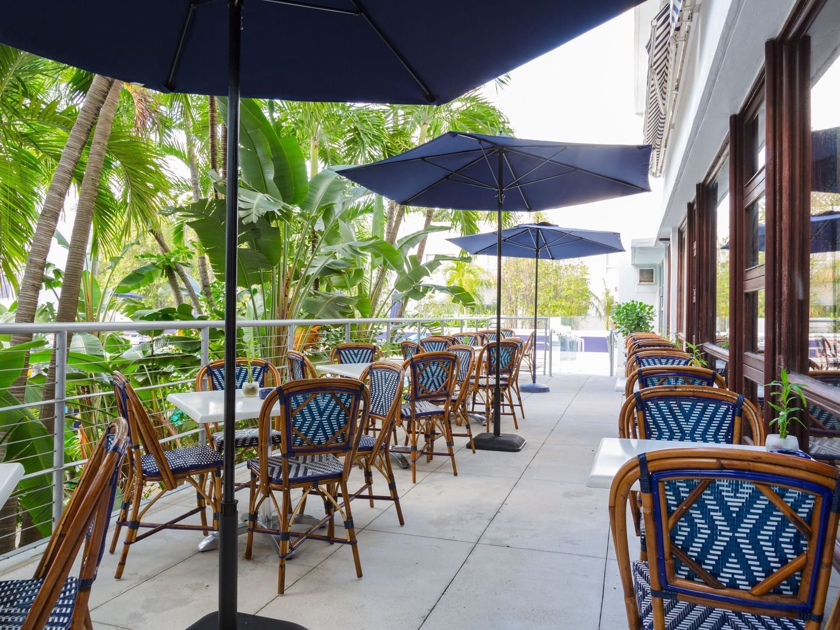 Outdoor dining area in Albion Café at Albion Miami Beach