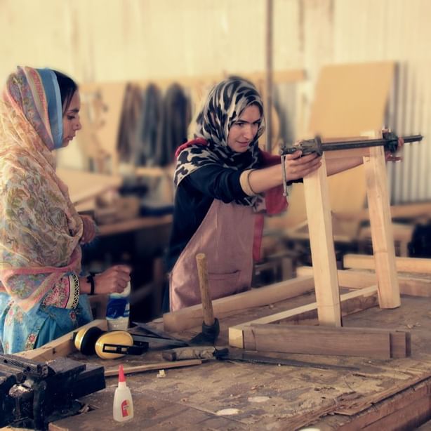 Two ladies working at CIQAM  enterprise near Serena Altit Fort