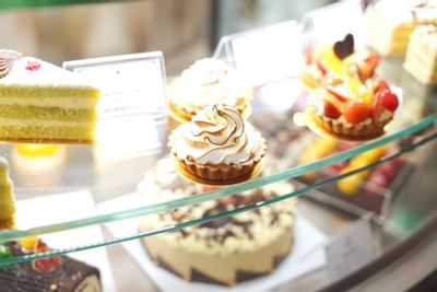 Close-up of Cream pies & cake display at Hanoi Daewoo Hotel