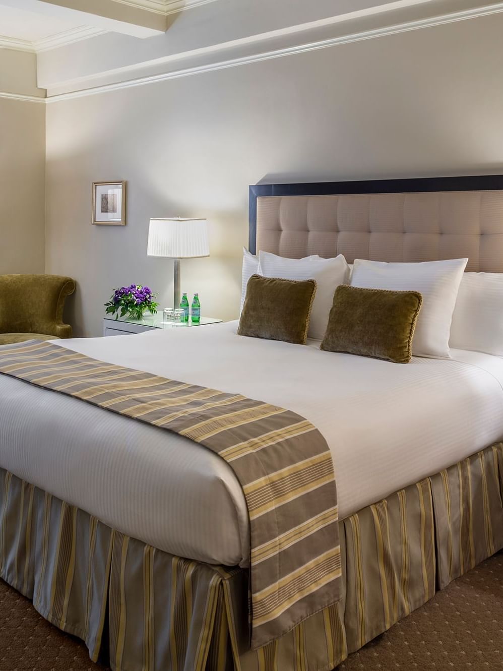 Bed with side tables near window in Accessible Premier City View at Warwick New York