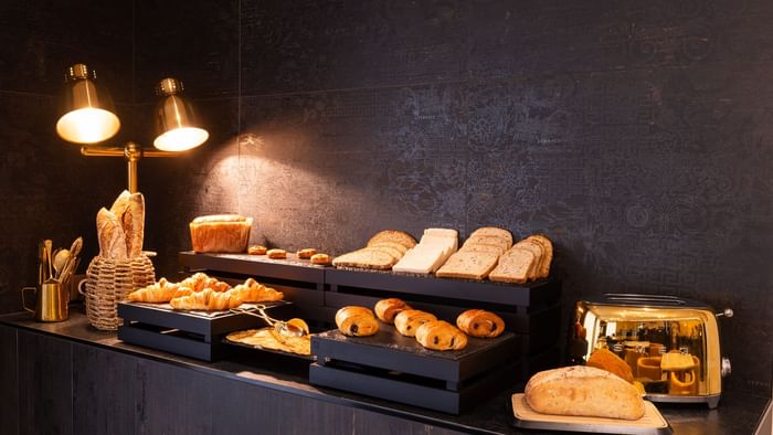 Buffet arrangement on a table at Hotel Rennes South Chantepie