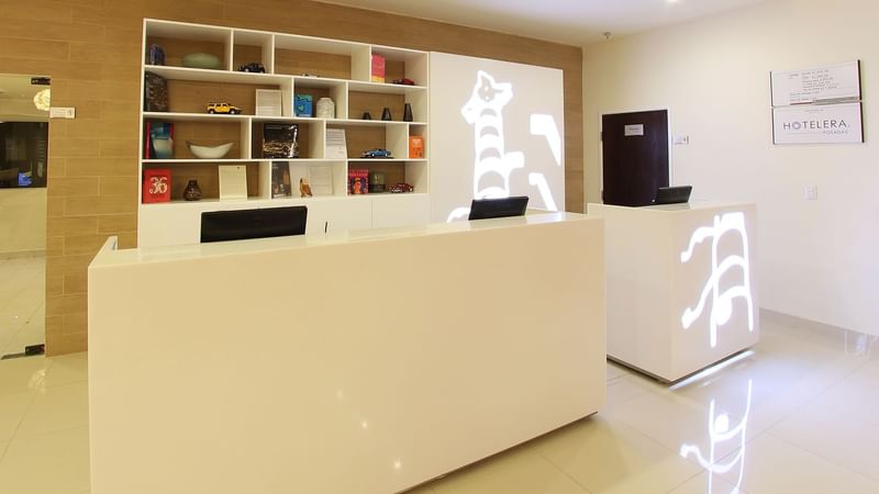 Reception counter in the lobby at Fiesta Inn Coatzacoalcos