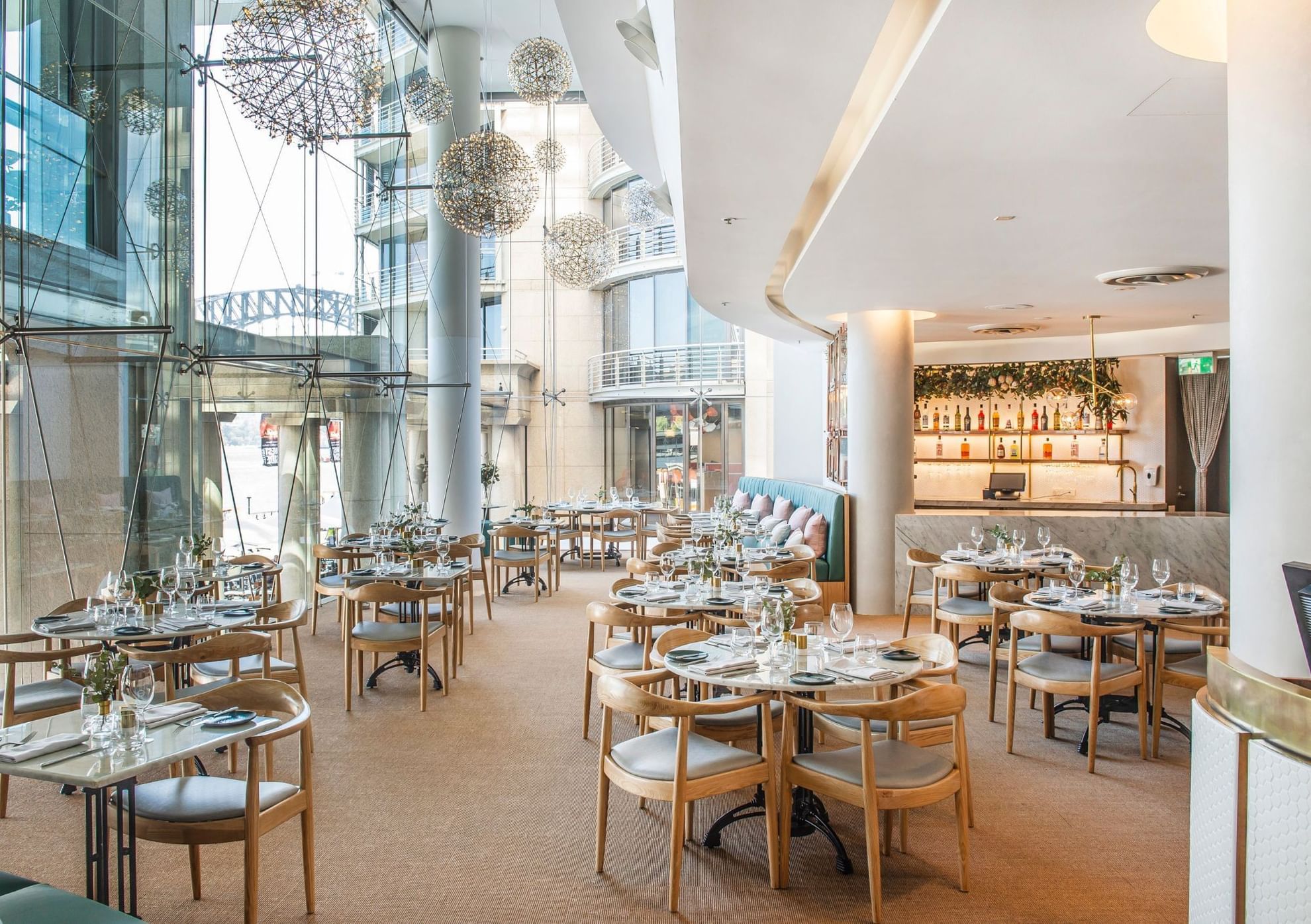 View of the indoor dining and lounge area in the restaurant at Pullman Quay Grand Sydney