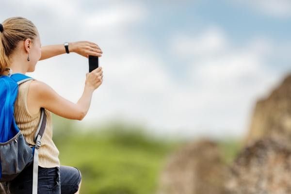 Women taking photo of ruins, Waverly Abbey is one of the best free places to visit in Surrey